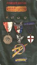 John Aiken's many Boy scout metals